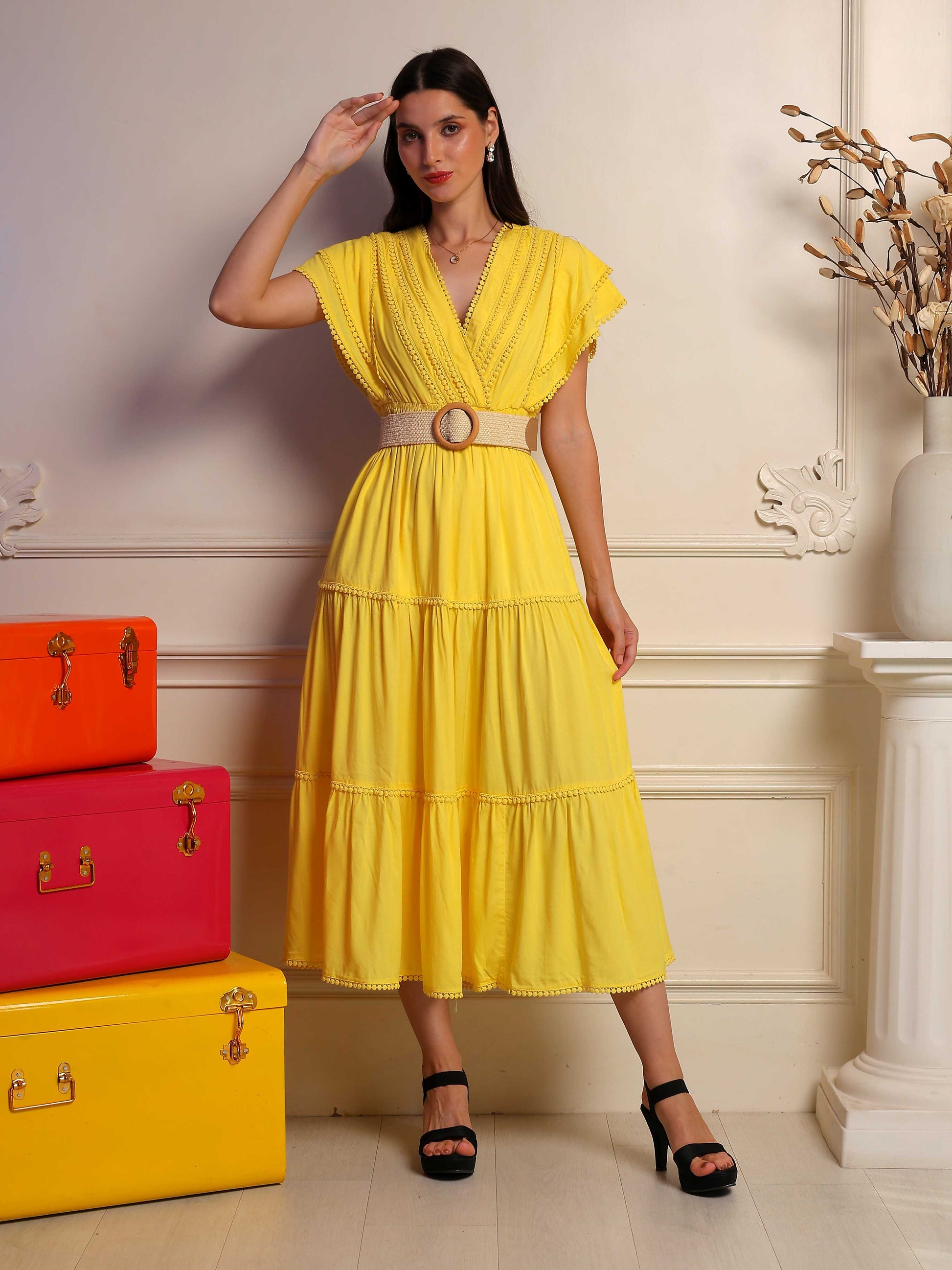 Sunlit mustard midi dress by Fabium Fashion featuring a flowy silhouette and sleeveless design, perfect for summer occasions.