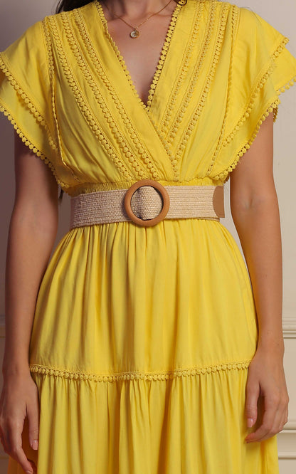 Sunlit Mustard Midi Dress by Fabium Fashion featuring a flowy design and sleeveless style, perfect for warm weather.