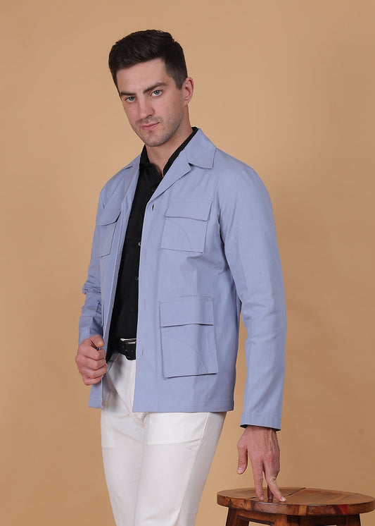 Fabium Celeste Command Utility Jacket in navy, featuring multiple pockets and a tailored fit, displayed on a hanger.